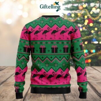 This Pink Flamingo Ugly Christmas Sweater brings beach vibes to the snowstorm