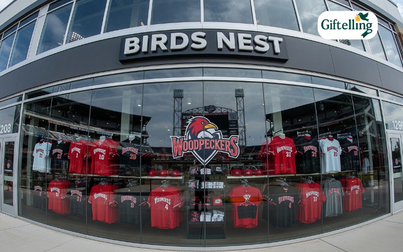 The Birds Nest team store at Segra Stadium displaying official Fayetteville Woodpeckers jerseys and merchandise collection